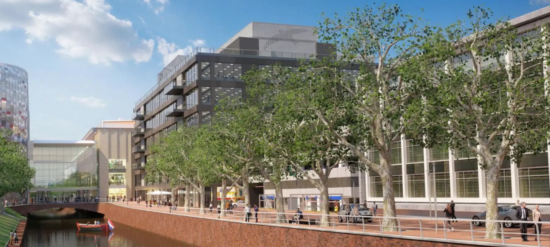 Impressie van platanen langs een gracht bij moderne kantoorgebouwen